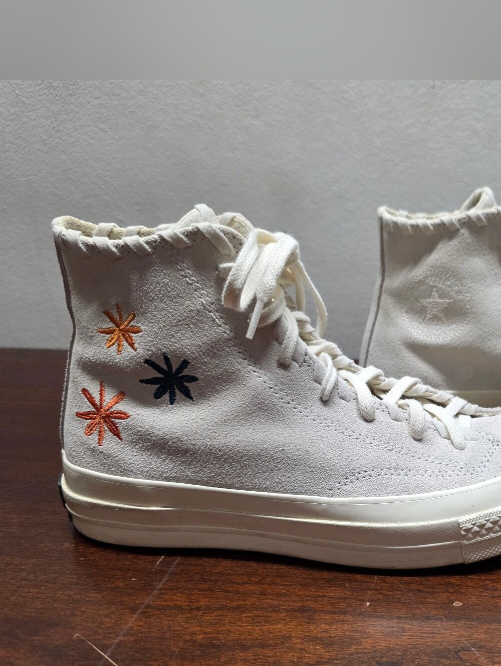Converse Chuck Taylor High-Top Sneakers in Cream with Red Logo